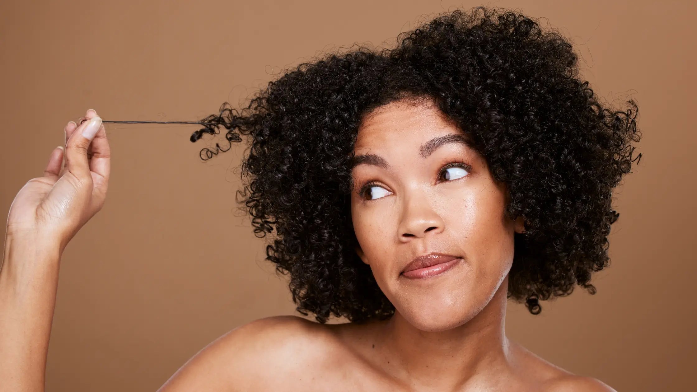 Unravelling Curly Hair Care: What Products to Use for Remarkable Curls in South Africa with Deluxe Shop